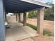 Covered patio with brick support columns, offering a great outdoor space at 836 W Laguna Azul Ave, Mesa, AZ 85210