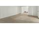 Bedroom with carpet floors and doorways to the hallway and adjacent room at 8717 W Turney Ave, Phoenix, AZ 85037