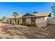 Charming single-story home with desert landscaping and mature trees in a residential neighborhood at 8717 W Turney Ave, Phoenix, AZ 85037