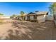 Charming single-story home with desert landscaping and mature trees in a residential neighborhood at 8717 W Turney Ave, Phoenix, AZ 85037