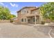 Home exterior highlighting the spacious backyard and covered patio at 8754 W Karen Lee Ln, Peoria, AZ 85382