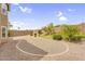 Low-maintenance backyard with desert landscaping and privacy wall at 8754 W Karen Lee Ln, Peoria, AZ 85382