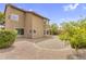 Exterior view of a two-story home with a well-maintained, low-maintenance backyard at 8754 W Karen Lee Ln, Peoria, AZ 85382