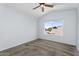 Bedroom with ceiling fan, carpeted floor and view from the window at 8754 W Karen Lee Ln, Peoria, AZ 85382