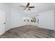 Spacious bedroom featuring a ceiling fan, neutral colors and a large bay window at 8754 W Karen Lee Ln, Peoria, AZ 85382
