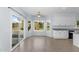 Bright dining area with tile floors, neutral walls, and sliding doors to the patio at 8754 W Karen Lee Ln, Peoria, AZ 85382