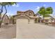Home with three car garage and desert landscaping at 8754 W Karen Lee Ln, Peoria, AZ 85382