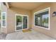 Exterior patio featuring access to the home with direct view into kitchen at 8754 W Karen Lee Ln, Peoria, AZ 85382