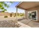 Covered patio with direct access to the home's interior through sliding glass doors at 8754 W Karen Lee Ln, Peoria, AZ 85382