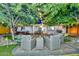 Inviting backyard oasis with a lounge area, hot tub and landscaping at 8930 W Sells Dr, Phoenix, AZ 85037