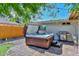Backyard with a hot tub, barbecue grill, and a brick patio at 8930 W Sells Dr, Phoenix, AZ 85037