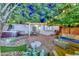 Enjoyable backyard featuring a hot tub and lots of space for gathering with loved ones at 8930 W Sells Dr, Phoenix, AZ 85037
