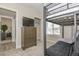 Practical bedroom with a bunk bed, dresser, and convenient storage options at 8930 W Sells Dr, Phoenix, AZ 85037
