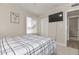 Bedroom featuring neutral walls and trim, complemented with new furnishings at 8930 W Sells Dr, Phoenix, AZ 85037