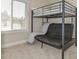 Bedroom with a functional bunk bed setup, ideal for or guests at 8930 W Sells Dr, Phoenix, AZ 85037