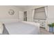 Comfortable bedroom with a plush bed, ample storage, and a serene atmosphere at 8930 W Sells Dr, Phoenix, AZ 85037