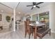 Dining room featuring a dark wood table and chairs with views into the kitchen and living room at 8930 W Sells Dr, Phoenix, AZ 85037