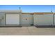 Garage exterior with gated access and well-maintained surroundings at 10072 W Lancaster Dr, Sun City, AZ 85351