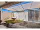 Enclosed patio with garden area and brick wall detail at 10072 W Lancaster Dr, Sun City, AZ 85351