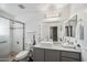 Well-lit bathroom with modern fixtures, bright countertop, and a glass-enclosed shower for a luxurious feel at 10401 N 52Nd St # 210, Paradise Valley, AZ 85253