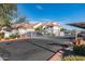 Gated entrance to the complex featuring security gate and well maintained landscaping at 10401 N 52Nd St # 210, Paradise Valley, AZ 85253