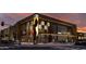 Commercial building Harkins Cine Grill with impressive architecture featuring street-level pedestrian access and neon signage at 10401 N 52Nd St # 210, Paradise Valley, AZ 85253