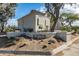 Marbeya complex featuring well-maintained landscaping and a stucco exterior, creating an inviting curb appeal at 10401 N 52Nd St # 210, Paradise Valley, AZ 85253