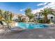 Resort-style pool surrounded by lush landscaping and comfortable lounge chairs for ultimate relaxation and enjoyment at 10401 N 52Nd St # 210, Paradise Valley, AZ 85253