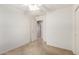 This bedroom has neutral carpet, a ceiling fan, and attached bathroom at 1071 E Chelsea Dr, San Tan Valley, AZ 85140