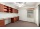 Office or bedroom with a built-in desk, cabinets and shelving at 1071 E Chelsea Dr, San Tan Valley, AZ 85140