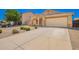 Charming single-story home featuring desert landscaping and a spacious two car garage at 1071 E Chelsea Dr, San Tan Valley, AZ 85140