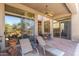 Brick patio featuring outdoor seating and lounge chairs at 10869 E Hedgehog Pl, Scottsdale, AZ 85262