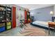 A spacious bedroom with lots of shelving and a window at 11051 N 45Th Pl, Phoenix, AZ 85028