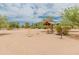 Community park with sand volleyball and basketball court, picnic tables, and BBQ for outdoor recreation at 11051 N 45Th Pl, Phoenix, AZ 85028