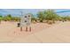 Community park sign amid desert landscaping with a walking trail visible in the background at 11051 N 45Th Pl, Phoenix, AZ 85028