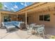 Covered patio featuring comfortable seating and a dining area, perfect for outdoor gatherings and relaxation at 11051 N 45Th Pl, Phoenix, AZ 85028