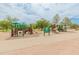 Community playground featuring multiple play structures, slides, and climbing areas for enjoyment at 11051 N 45Th Pl, Phoenix, AZ 85028