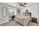 Bedroom with window and built in desk area at 1140 E Vermont Dr, Gilbert, AZ 85295