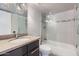 Modern bathroom featuring sleek fixtures, glass shower, and stylish vanity at 1147 E Belmont Ave, Phoenix, AZ 85020