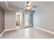 Cozy bedroom features a modern ceiling fan and direct access to the outdoor area at 1147 E Belmont Ave, Phoenix, AZ 85020