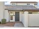 Inviting front entrance showcasing a secure gate, address number, and well-maintained landscaping at 1147 E Belmont Ave, Phoenix, AZ 85020