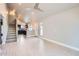 Bright living room with hardwood floors, a staircase leading to the upper level, and open layout at 1147 E Belmont Ave, Phoenix, AZ 85020