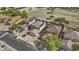 Aerial view of the home showing solar panels, landscaping and neighborhood at 11915 W Charter Oak Rd, El Mirage, AZ 85335
