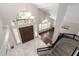 View from the second floor landing down into the foyer with chandelier at 15215 S 20Th Pl, Phoenix, AZ 85048