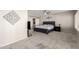 Comfortable main bedroom with a ceiling fan, bright windows, and neutral carpeting at 15215 S 20Th Pl, Phoenix, AZ 85048