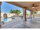 Backyard pool and covered patio with ceiling fans and outdoor furniture at 15215 S 20Th Pl, Phoenix, AZ 85048