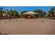 Community playground featuring multiple swing sets and covered play structures providing a safe, fun environment at 15215 S 20Th Pl, Phoenix, AZ 85048