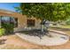 Relaxing backyard patio area shaded by mature trees at 15610 N 98Th Ave # 26, Sun City, AZ 85351