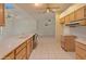 Bright kitchen featuring ample counter space and natural light at 15610 N 98Th Ave # 26, Sun City, AZ 85351