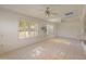 Bright living room with tile floors, large windows, neutral paint, and lots of natural light at 15610 N 98Th Ave # 26, Sun City, AZ 85351
